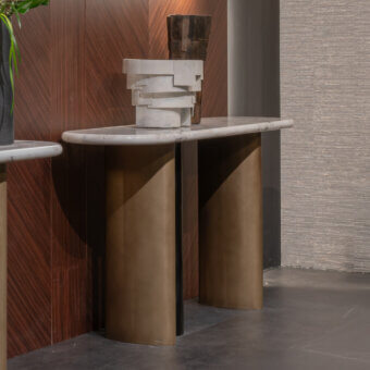Architectural Zanaboni Cloud console with oval marble top and satin bronze metal pillars in glossy black lacquer