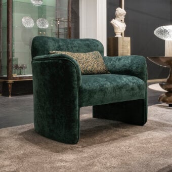 Distinguished Zanaboni Erica lounge chair crafted in green velvet with a ribbed texture and unique monolithic base