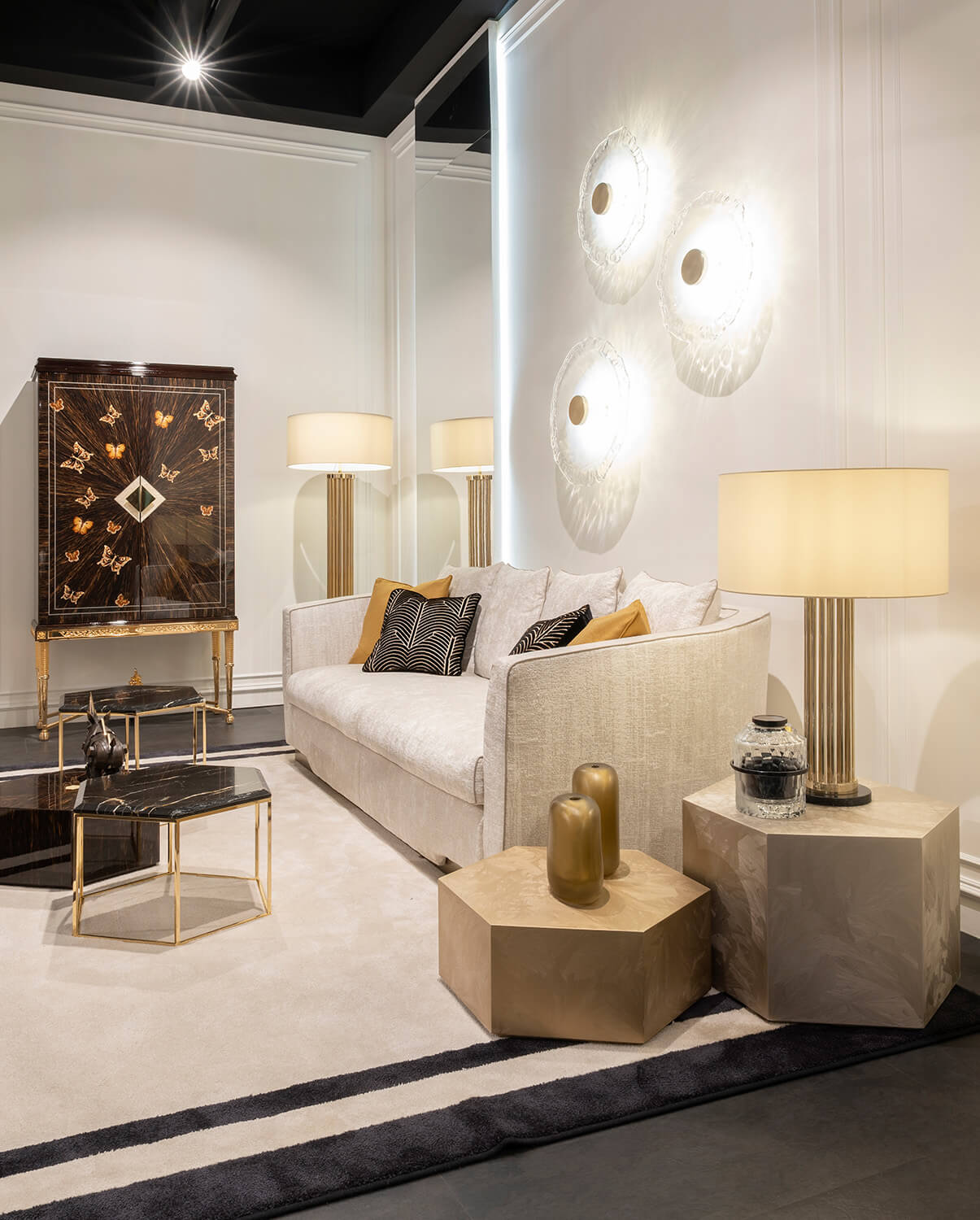 Lavish Zanaboni Morgana sofa with enveloping silhouette in tactile light beige fabric and satin brass finish