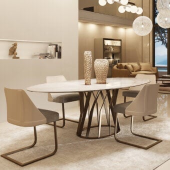 Distinguished Zanaboni Ray table with luminous marble and articulated bronzed metal offering a refined chromatic contrast