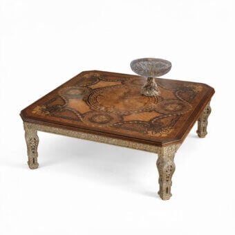 Distinguished Armando Rho A1210 coffee table crafted in crotch walnut and bois de rose with gold leaf finish