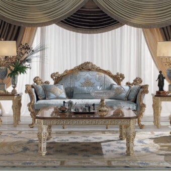 Distinguished Armando Rho A1225 sofa with pale blue textile and sculpted natural oak frame accented with refined gold leaf detailing