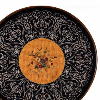 Exceptional Armando Rho A1251 coffee table crafted with ebony and yew wood exhibiting a floral inlay in glossy and matte finishes