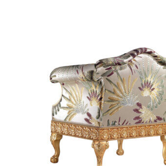 Distinguished Armando Rho A1268 lounge chair with gold leaf finish and tailored upholstery in stylized foliage of green, gold, burgundy