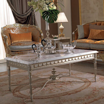 Distinguished Armando Rho A1282 coffee table with sculptural brass structure and silver leaf finish in marble