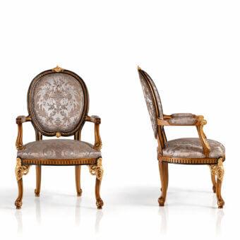 Elegant Armando Rho 1205 chair handcrafted in walnut-tone wood with black and gold leaf accents and patterned beige gray textile upholstery