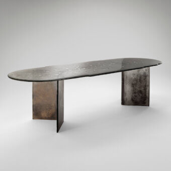 Exceptional Arte Veneziana Bisatello table built with irregular baked glass exhibiting a silvered degradé finish and dark-toned metal bases