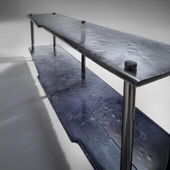 Luxury Arte Veneziana Canocia console crafted with baked glass transitioning from midnight blue to crystal transparency with polished nickel iron frame