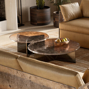 Distinguished Arte Veneziana Marantego coffee table with dual-layer glass exhibiting bronze to crystal degradé and polished nickel iron support