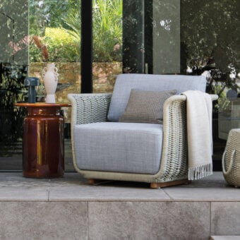 Exceptional Atmosphera Bellagio lounge chair with light gray hand-woven acrylic yarn and open-weave construction