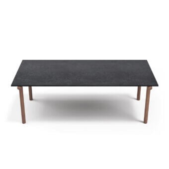 Elegant Atmosphera Pipe table with a textured black gres top and solid Asian teak legs