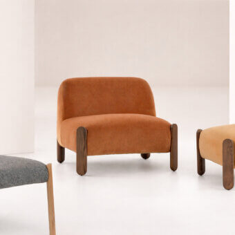 Distinguished Billiani Babà Soft lounge chair with warm orange textile upholstery and satin-finish wood frame