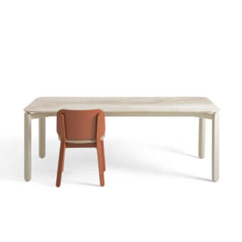Elegant Billiani Babà dining table crafted in light-colored wood with visible grain and matte finish, featuring pale legs