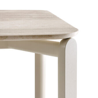 Distinguished Billiani Babà dining table with textured stone and gently curved light beige wood legs crafted in a minimalist finish