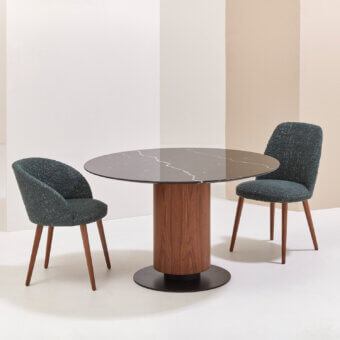 Distinguished Billiani Colonna dining table with circular marble top and solid walnut central column, exhibiting a glossy, satin finish