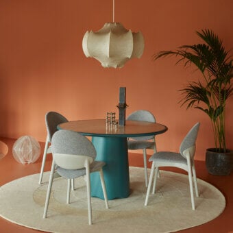 Superior Billiani Corolla dining table crafted in muted teal with satin finish and balanced pedestal base