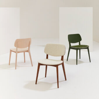 Distinguished Billiani Doll dining chair with off-white upholstered back and seat in satin finish wood<