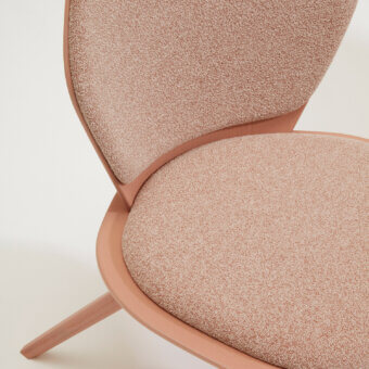 Elegant Billiani Edelweiss lounge chair with muted dusty rose textile and matte-finish wood construction