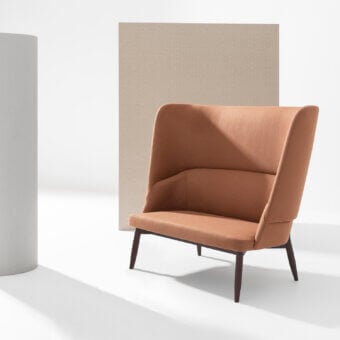 Superior Billiani Spy sofa with terracotta textile upholstery and subtly splayed dark-toned wood legs with satin finish