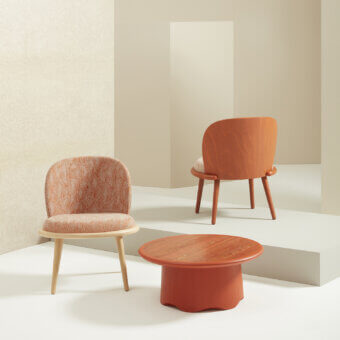 Exceptional Billiani Veretta lounge chair with curved solid beechwood and orange-brown patterned textile upholstery