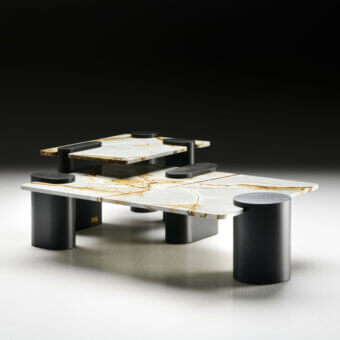 Distinguished Black Tie Amoris coffee table crafted with polished marble and quartzite exhibiting contrasting dark matte supports