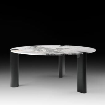 Exceptional Black Tie Amoris table crafted from marble and quartzite with polished finish and uniquely angled cutouts