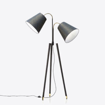 Superior Black Tie Bell floor lamp with a solid ash wood tripod base and gray and blue patterned fabric shades in matte black metal