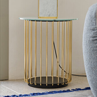 Elegant Black Tie Etan side table with black lacquered MDF base and clear back-lacquered glass top crafted with gold-finished metal