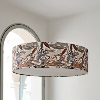 Distinguished Black Tie Omega Suspension Lamp featuring a cylindrical lampshade crafted with patterned fabric and painted steel structure