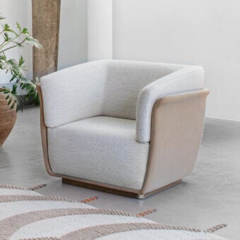 Exceptional Capital Allure lounge chair with creamy textured bouclé fabric and smooth satin light brown wooden base