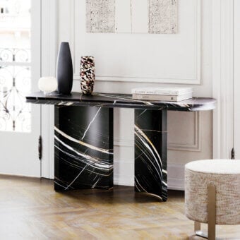 Distinguished Capital Ercole console sculpted from pure marble with dramatic black and gold veining and a polished glossy finish