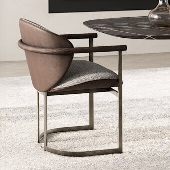 Distinguished Capital Flora armchair upholstered in muted brown textile with tubular leather armrests and galvanic-finished aluminum structure