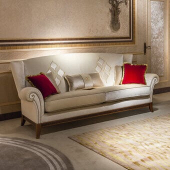 Lavish Carpanelli Arts sofa upholstered in cream textile with gold thread embroidery and light-toned wood base