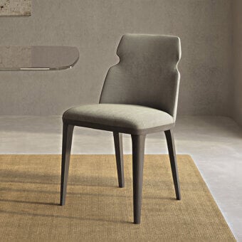 Exceptional Carpanelli Shape chair upholstered in muted gray-green patterned textile with satin-finish wood legs