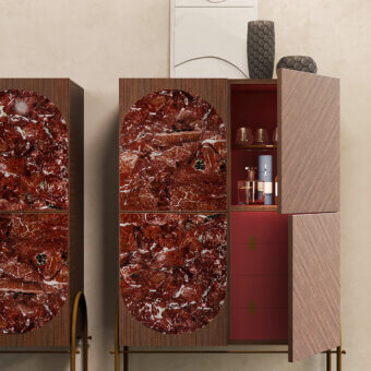 Sophisticated Carpanese Home Alma H cupboard built in warm brown wood with oval marble inlays and satin brass accents