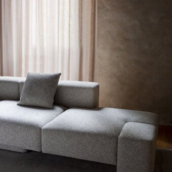 Distinguished Carpanese Home Cusco sectional crafted in muted gray textured fabric with plywood and polyurethane padding