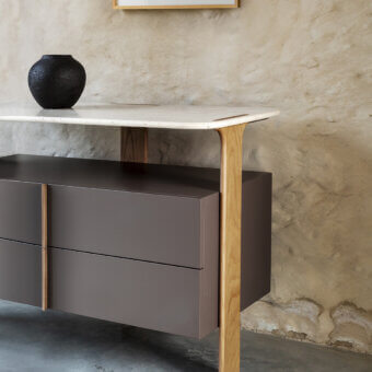 Superior Carpanese Home Trio D dresser with muted gray lacquered body and warm solid ash wood legs crafted with a luxurious marble tabletop