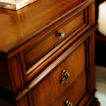 Exceptional Faber Mobili Chaumont nightstand crafted in walnut and walnut burl with glossy finish and ornate metal handles
