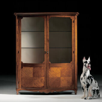 Distinguished Faber Mobili Correggio showcase with walnut and cherry wood construction in a satin finish