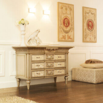 Distinguished Faber Mobili Constellation dresser crafted in wood with glossy gold tone finish and delicate floral motifs