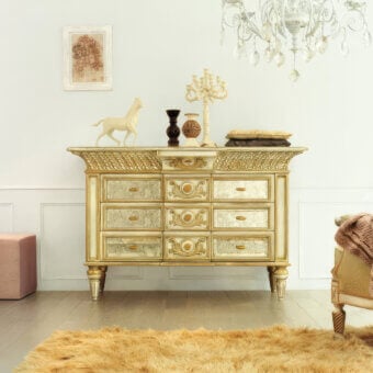 Lavish Faber Mobili Constellation dresser crafted in gold tone with floral carvings and antiqued ground mirrors