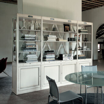 Distinguished Faber Mobili Khaju bookcase crafted in wood with a matte, textured finish and antiqued metal nameplates