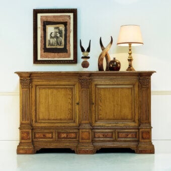 Elegant Faber Mobili Scarlino sideboard with imposing oak structure and olive ash burl drawer fronts in golden-brown finish