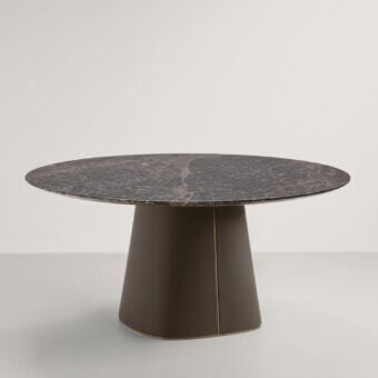 Superior Frag Artù dining table crafted in Italy with dark mottled marble and muted brown leather-upholstered metal detailing