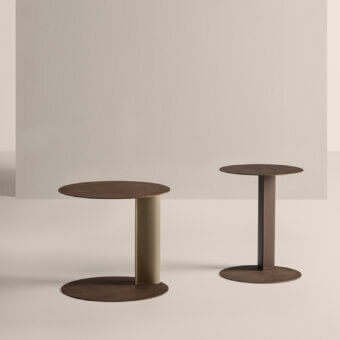 Distinguished Frag Bler side table crafted with steel and saddle leather, exhibiting a brushed finish and cylindrical form