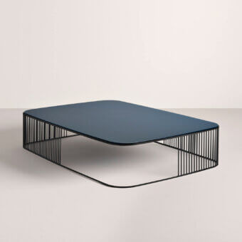 Distinguished Frag Comb coffee table with dark blue tinted glass top and sleek black metal frame in matte finish