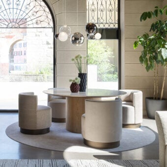 Distinguished Frag Myon dining table with warm wood-hue lacquered MDF tabletop and cylindrical base crafted in Italy