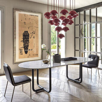 Superior Dainelli Studio Frag Paipu dining table with an elongated marble top and matte black steel base crafted in Italy