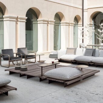 Sophisticated Giorgetti Apsara coffee table crafted with carob aluminum and Afrormosia wood slats in dark gray tones
