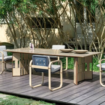 Distinguished Giorgetti Break table crafted with carob aluminum, stainless steel and warm ash wood with an Etna lava stone insert
